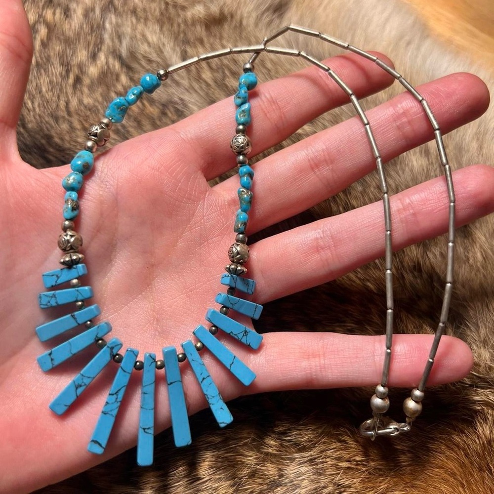 Silver toned liquid silver southwestern style graduated panel bead necklace